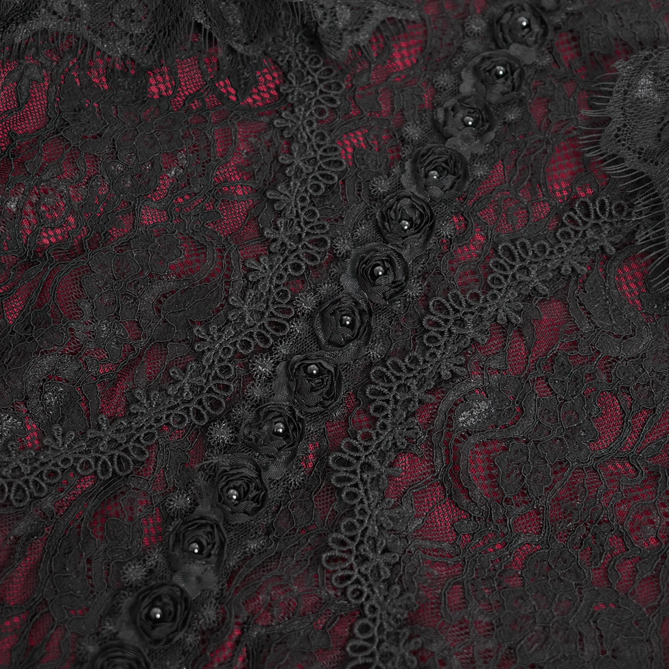 Detailed view of gothic lace blouse sleeve cuff featuring wine-red lining, decorative ruffles, and fitted bell sleeve silhouette