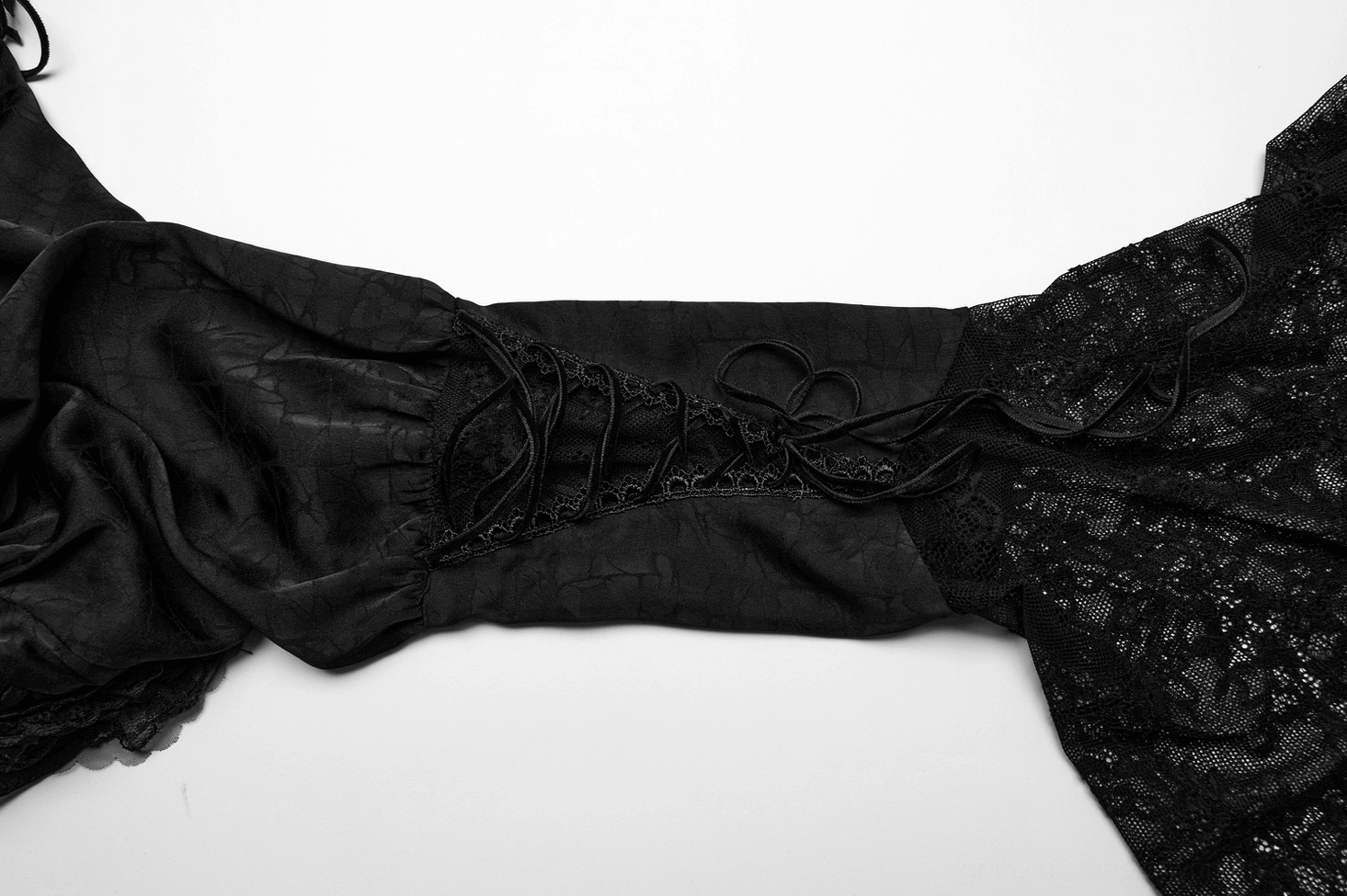 Black lace gothic blouse sleeve flare detail demonstrating arm-slenderizing sheer lace design