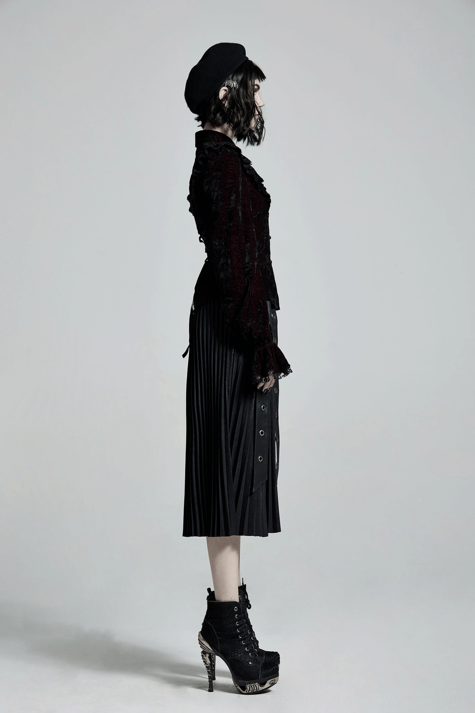 Gothic velvet blouse sleeve gathering and cuff construction detail with lace trim