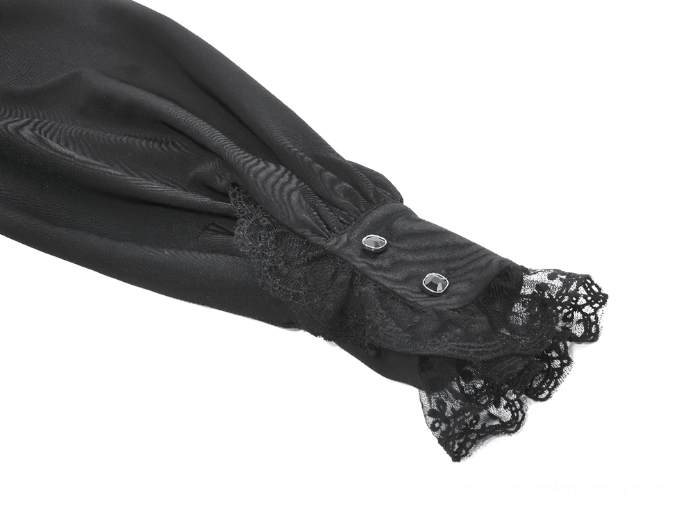 Black gothic lace blouse sleeve and cuff detail showing lace-trimmed wrist and long sleeve construction