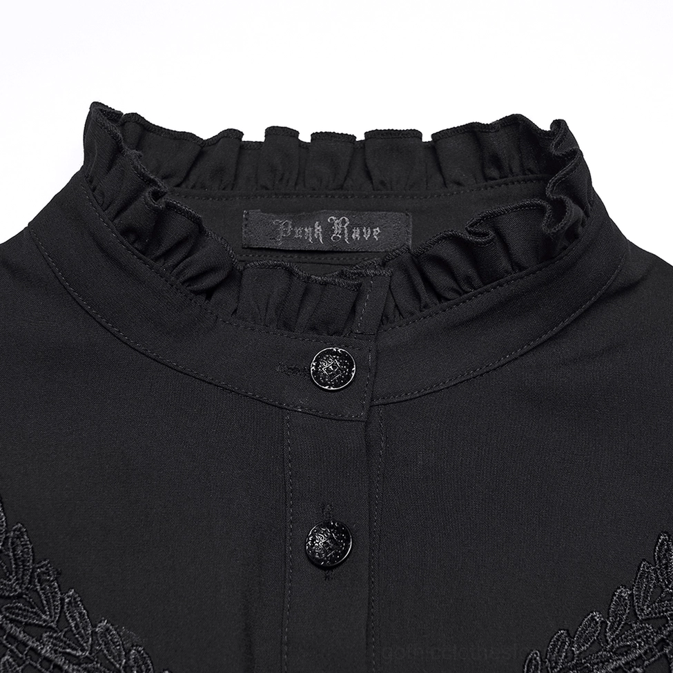 Black gothic blouse neckline detail - close-up of stand-up collar with ruffles and branded button placket