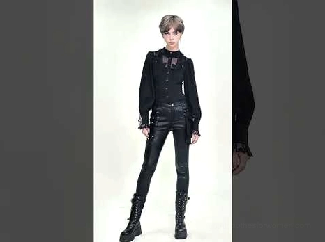 Black lace Victorian gothic blouse styled with leather pants and combat boots for alternative fashion