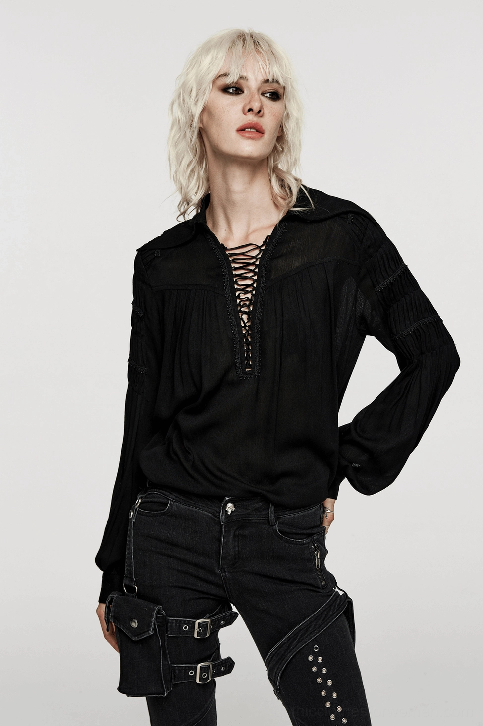 Victorian gothic lace-up blouse front detail showing deep V-neck lacing and collar structure on model