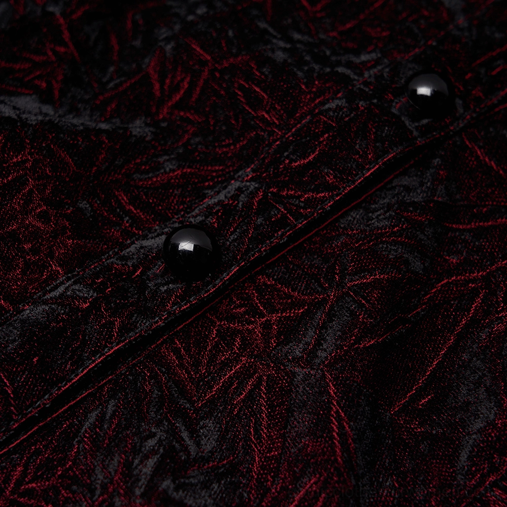 Close-up detail of burgundy black jacquard velvet fabric and round black front buttons