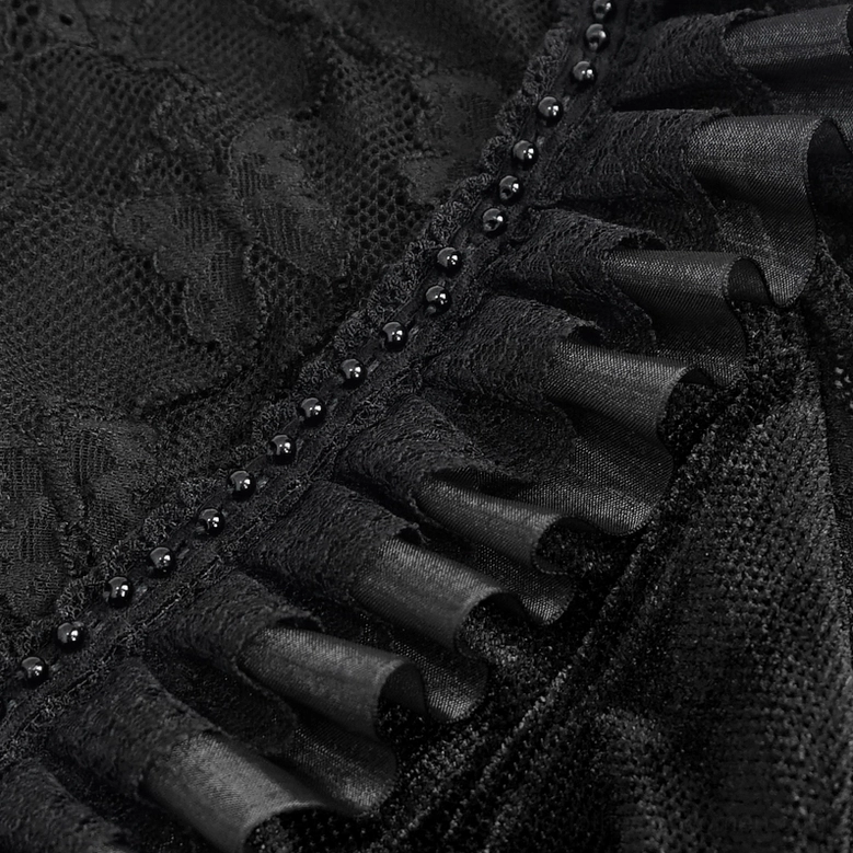 Black gothic velvet lace blouse construction detail showing velvet and lace panel integration and stitching craftsmanship