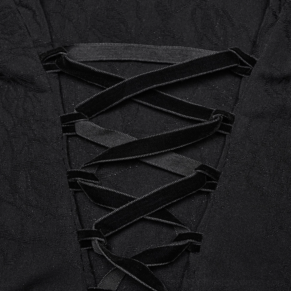 Close-up detail of black gothic blouse back lace-up closure featuring velvet ribbon lacing and textured knitted fabric base