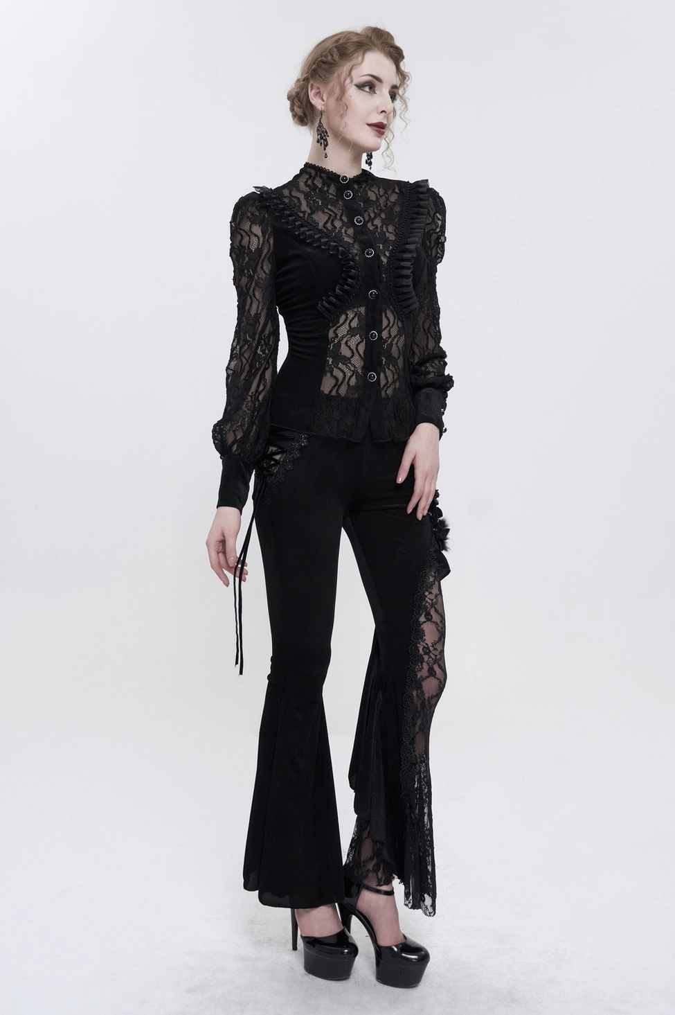 Black gothic velvet blouse detail view showing the interplay between opaque velvet bodice and sheer floral lace elements