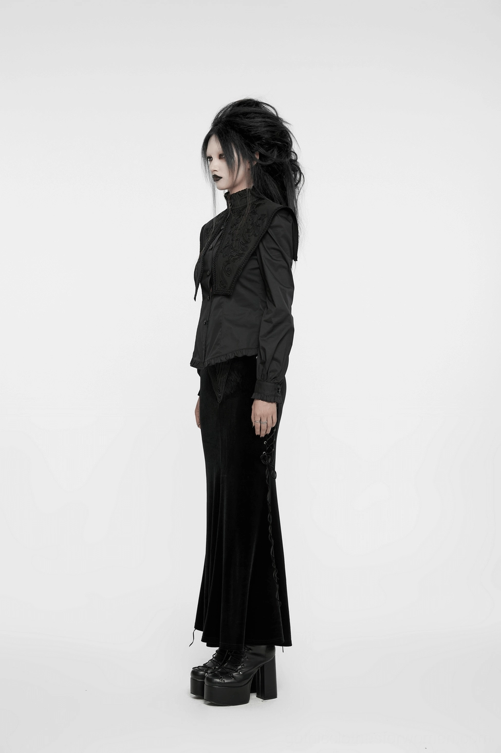Flat lay detail shot showing texture and construction of gothic blouse with wide shoulder seam