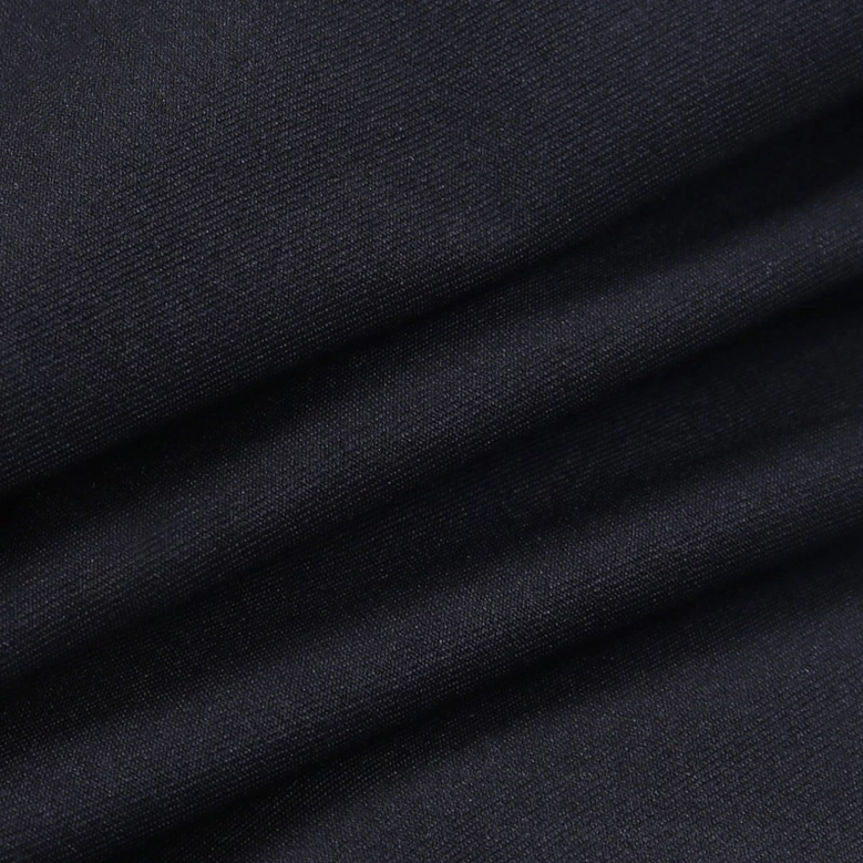 Back full-length view of black patent leather gothic mini dress showing cross straps and ruched back