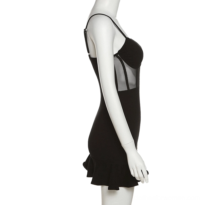 Black gothic fitted slip dress side view on mannequin, showing sheer mesh panel and ruffled hem detail