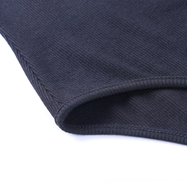 Gothic bodysuit sleeve and body construction, demonstrating ribbed knit fabric texture and fit