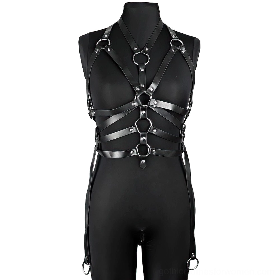 Full-body synthetic leather bondage harness with crisscross black faux leather straps and metal ring attachments displayed on mannequin