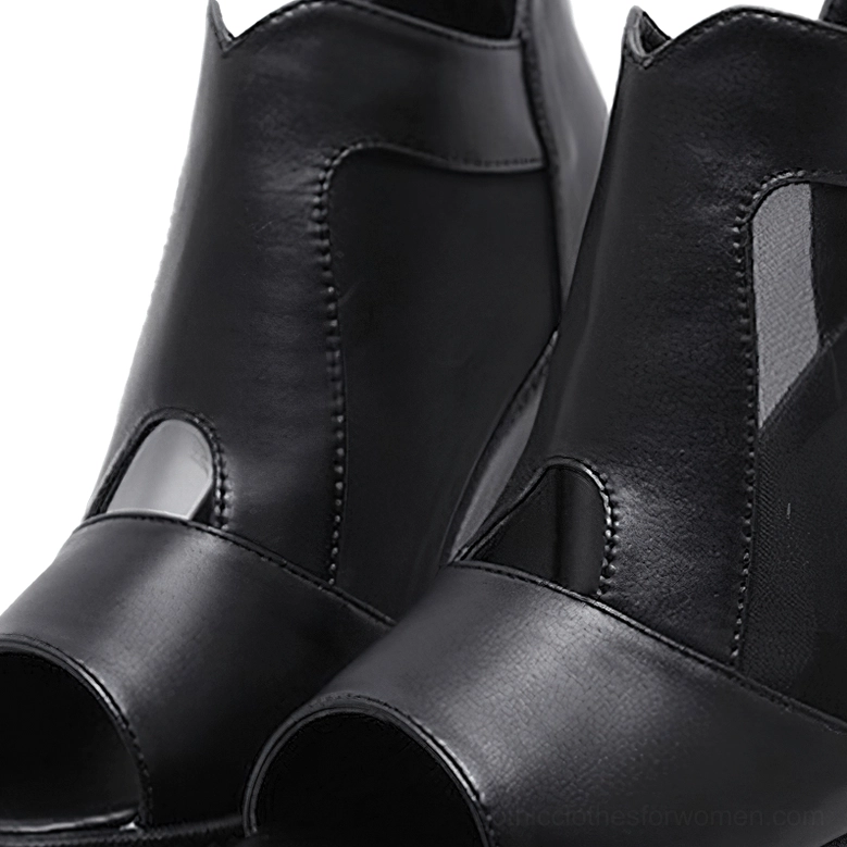 Rear view of women's black gothic platform ankle boots highlighting back zipper fastening system