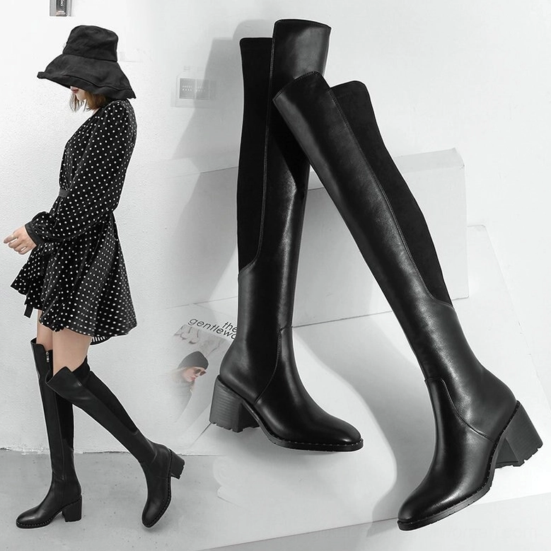 Black leather over-the-knee gothic boots styled with polka dot dress and hat, showcasing classic dark romantic aesthetic