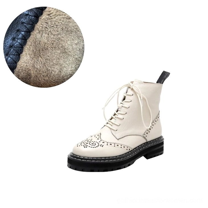 Close-up circular view of gothic boot plush fleece lining with detailed leather stitching and construction quality