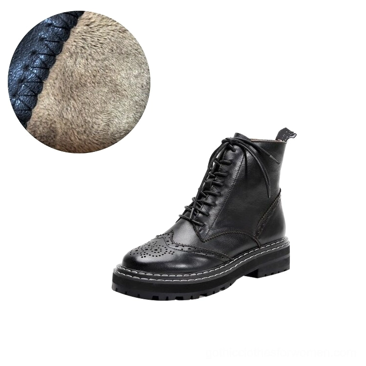 Close-up interior detail of gothic boots showing soft plush fleece lining and precise lockstitching on leather