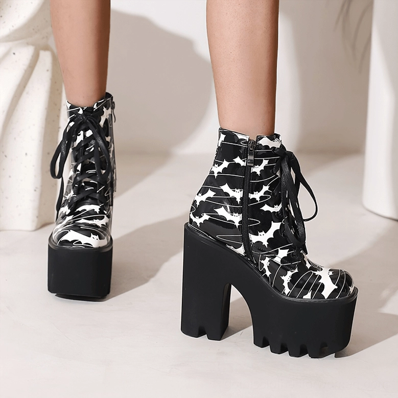 Gothic platform ankle boots for women with bat wing print, detailed view of lace-up front closure system and collar design on black microfiber