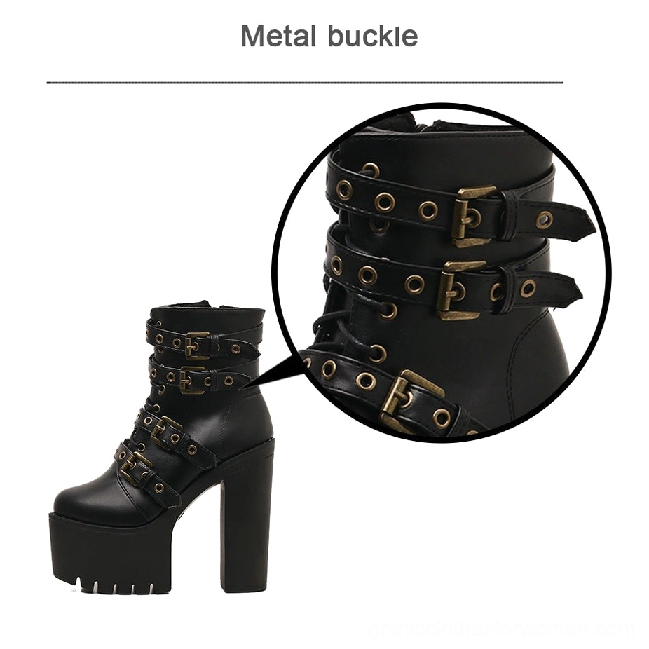 Detail callout of black gothic boots metal buckles and decorative rivets showing antiqued finish and industrial aesthetic hardware