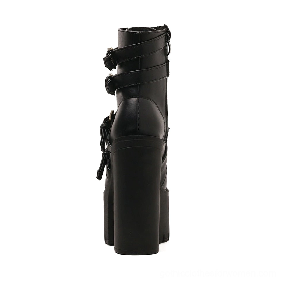 Rear view of gothic platform boots displaying side zipper closure, heel structure, and back strap details for easy on-off