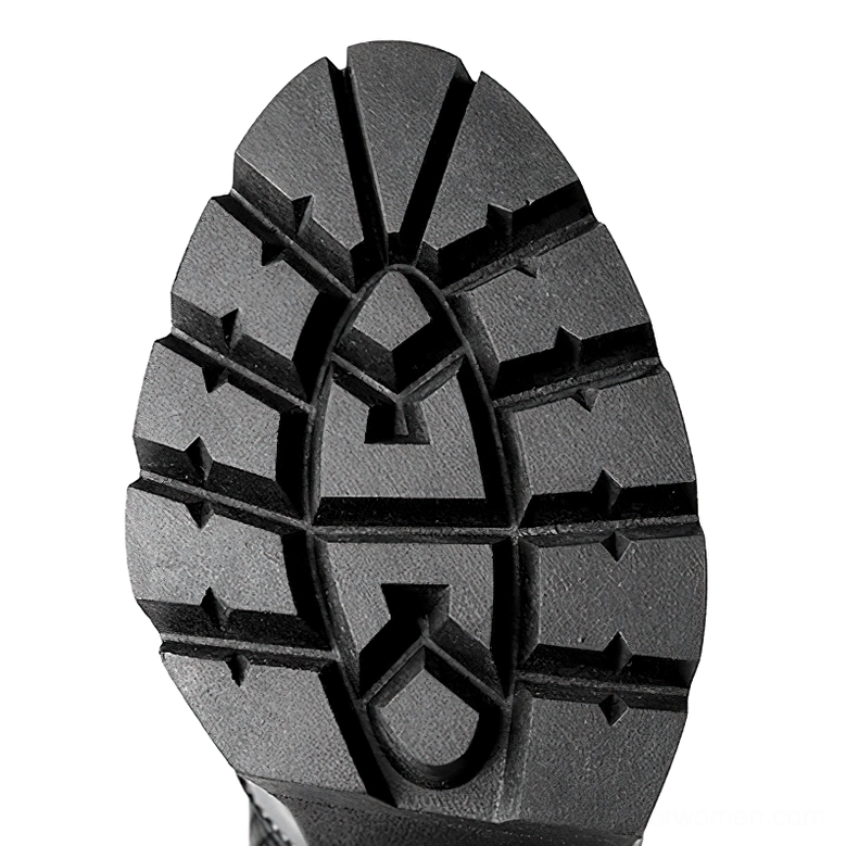 Outsole of gothic platform boots showing anti-slip rugged tread pattern and black rubber material