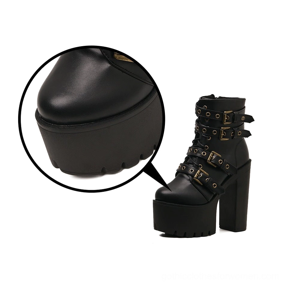 Close-up detail shot of gothic boot toe showing rounded toe shape, smooth PU leather finish, and thick waterproof platform base