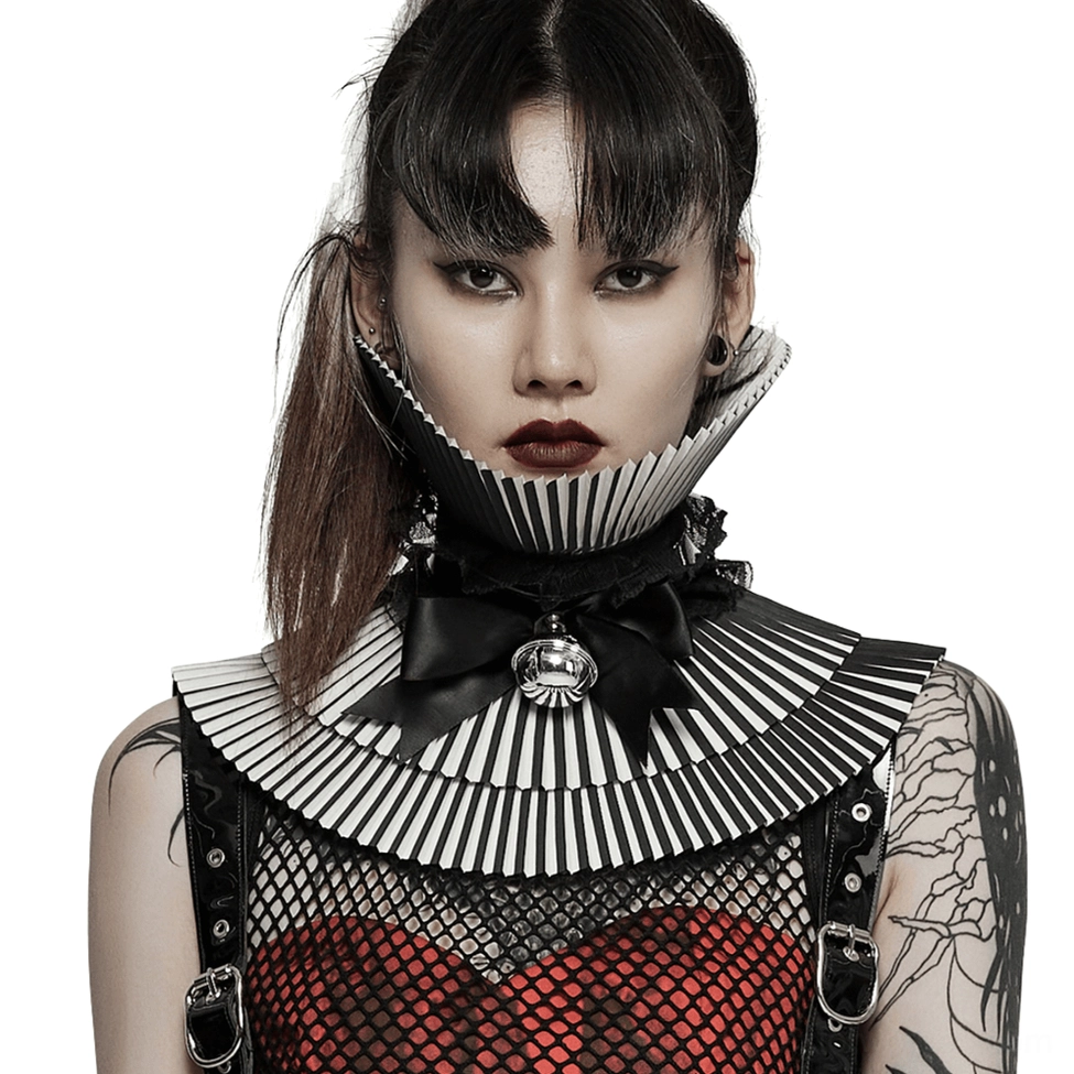 Black and white crimped gothic detachable bow choker with 3D skull accent, front view on tattooed model