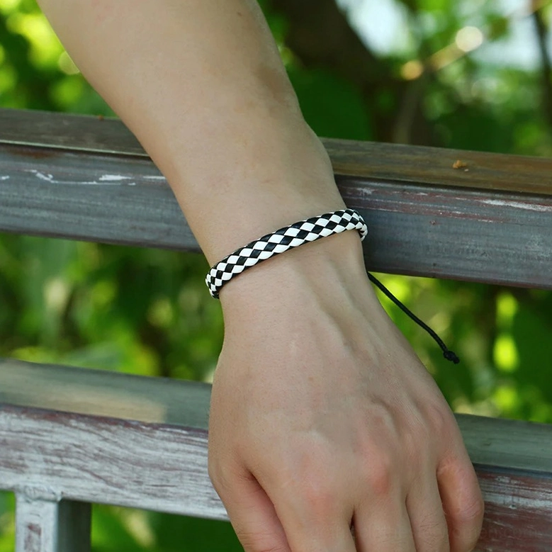 Adjustable braided leather gothic bracelet pulled tight showing flex and durability