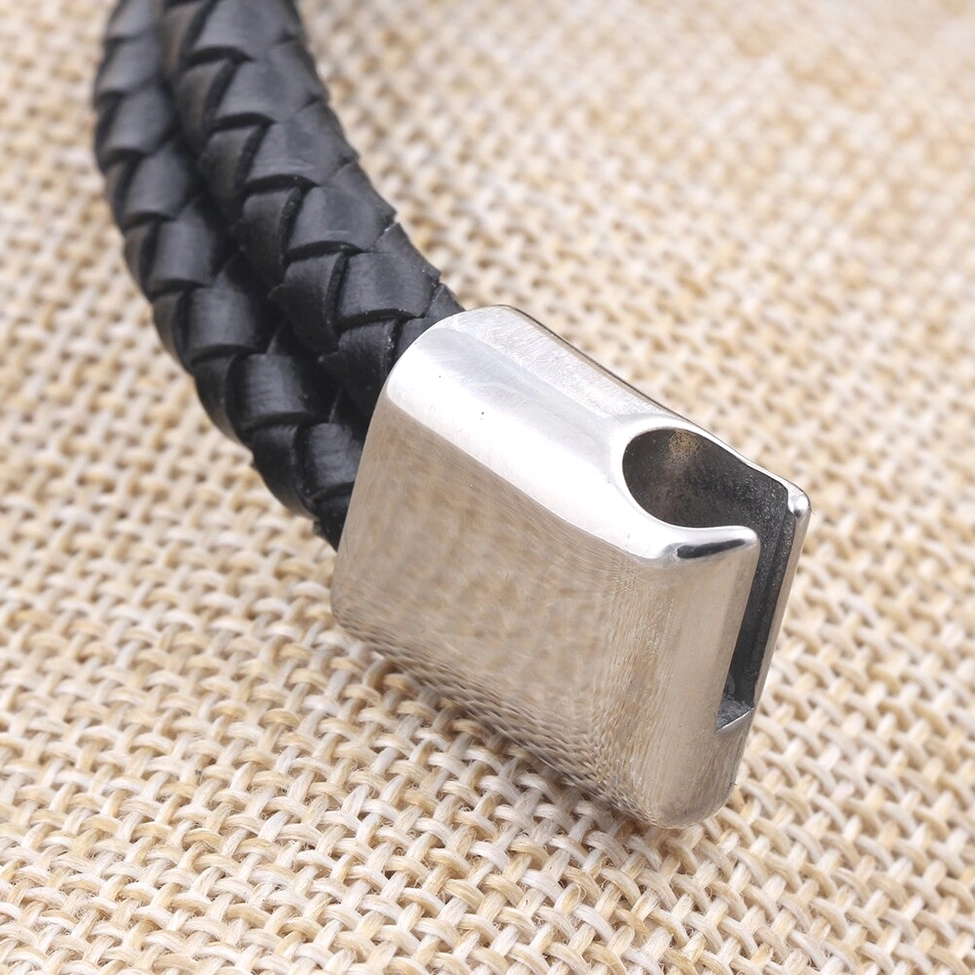 Left angle view of polished stainless steel toggle clasp with black leather on gothic wrap bracelet