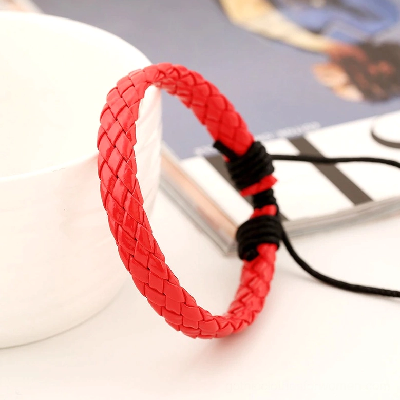Braided leather gothic bracelet arrangement showing geometric pattern intricacy