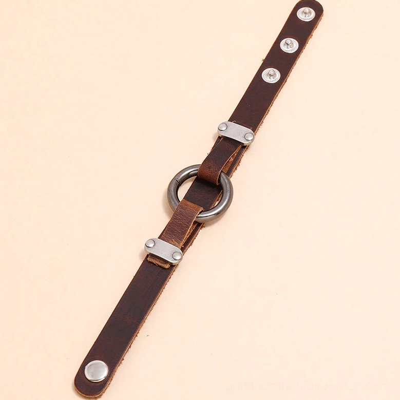 Unfastened distressed leather gothic bracelet strap displayed on neutral background, revealing adjustable snap buttons and antique silver metal components