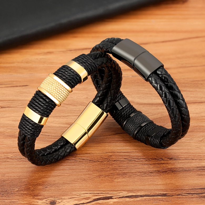 Two men's gothic bracelets comparison - gold-accented and gun-black variants showing double-layer braided construction