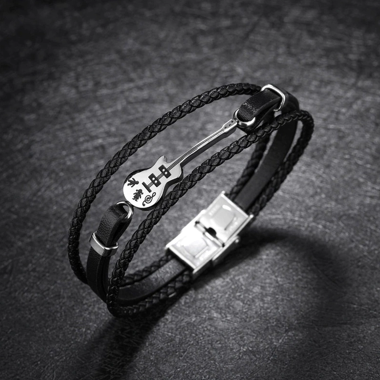 Bass guitar themed gothic leather bracelet with braided band and matte stainless steel clasp on dark background