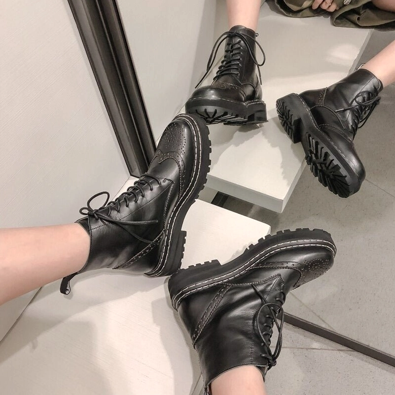 Gothic ankle boots with brogue cutouts in multiple color options - black, burgundy, and off-white leather options displayed