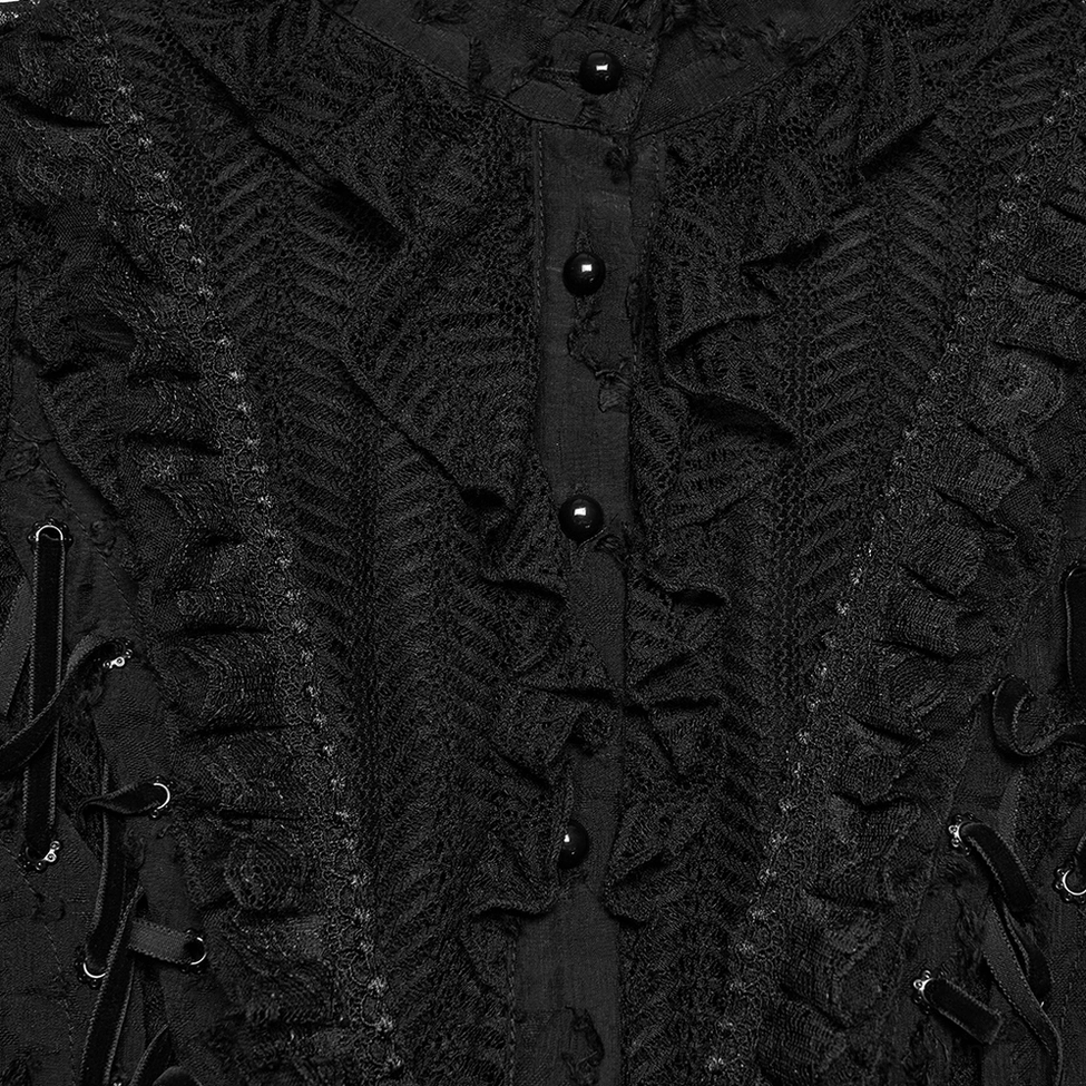 Close-up of gothic blouse front placket showing ruffled trim, black buttons and ribbon accents