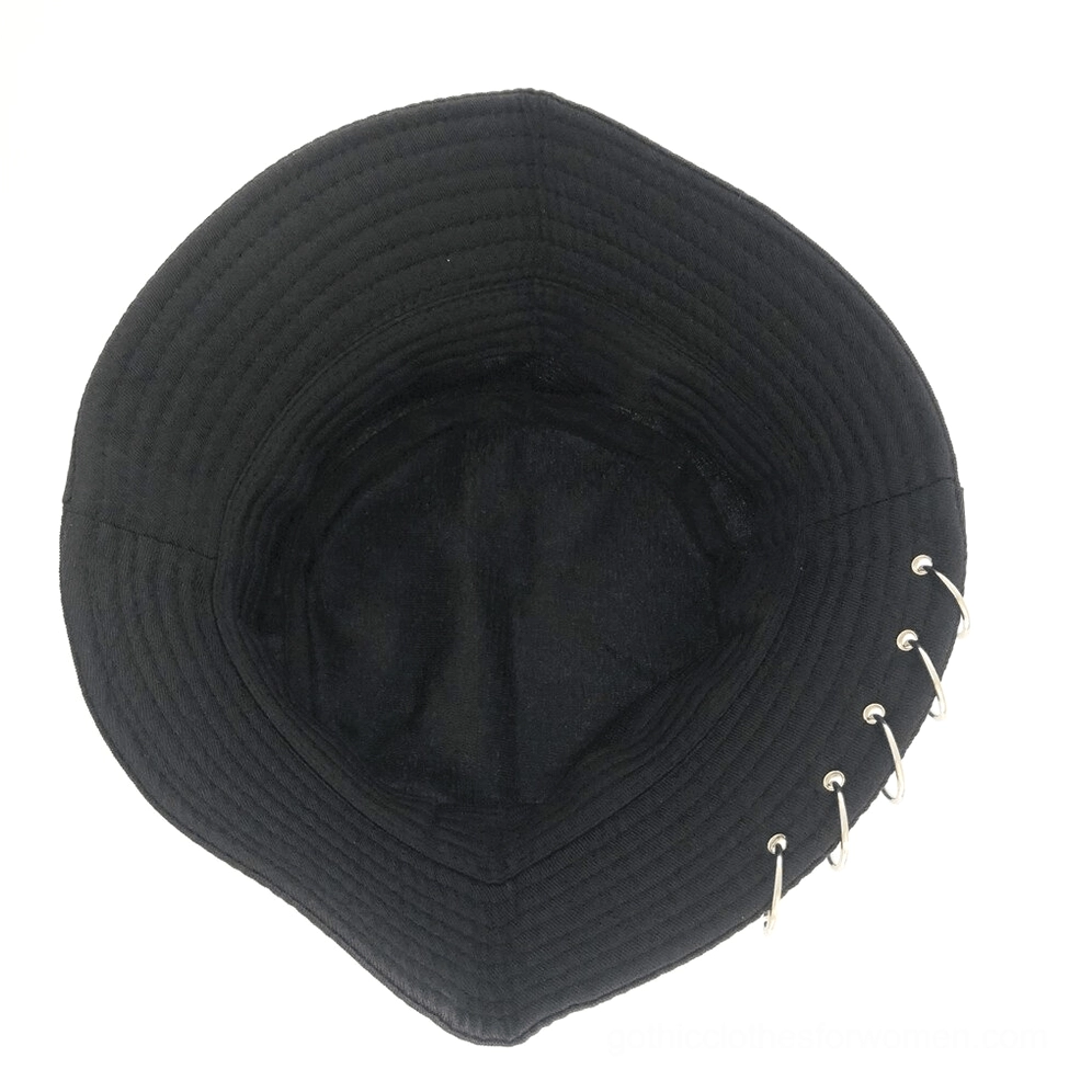 Interior view of black gothic bucket hat showing cotton lining and metal rings sewn on brim edge