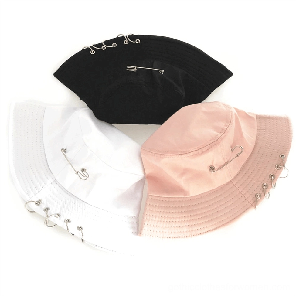 Three color variants of gothic pin ring bucket hats black white pink unified safety pin ring design flat lay