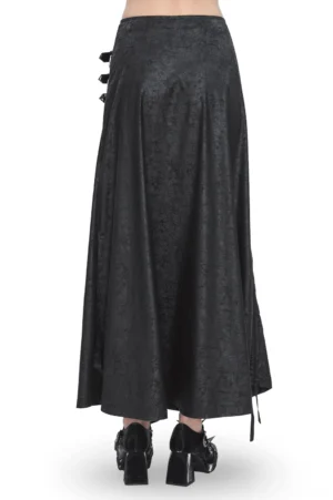 Black faux leather buckled maxi skirt rear view showcasing intricate lace-up back panel trim and cracked leather texture detail