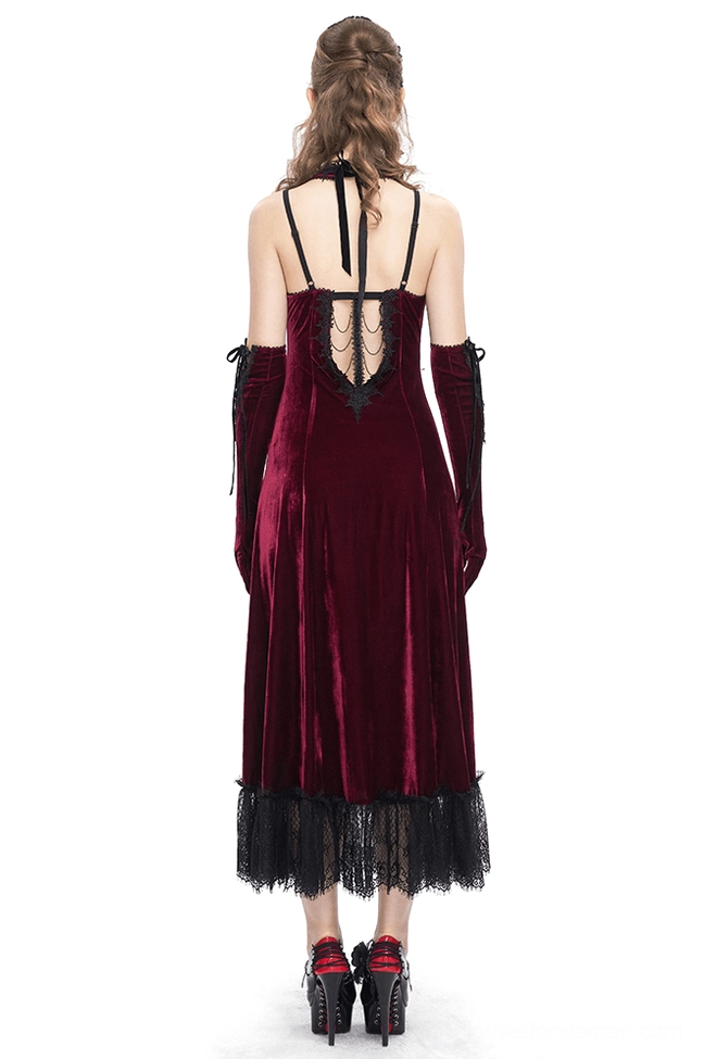 Burgundy gothic velvet dress with halter back straps and black lace hem, back full-body view showcasing cutout details