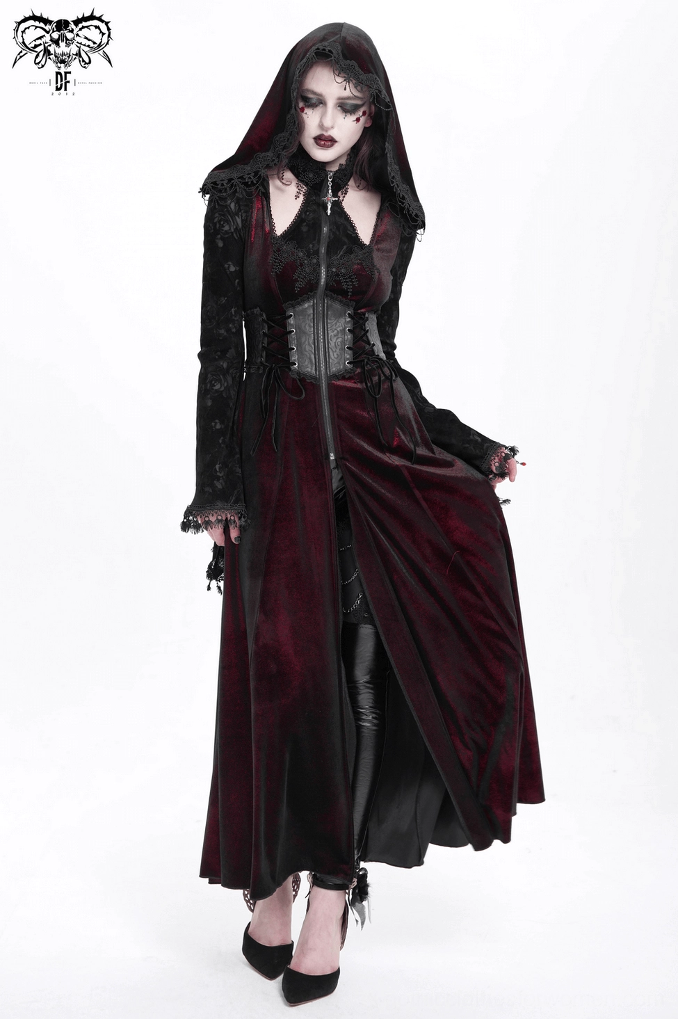 Gothic burgundy velvet maxi coat with hooded lace detailing, showing front silhouette and corset waist structure for dark fashion styling