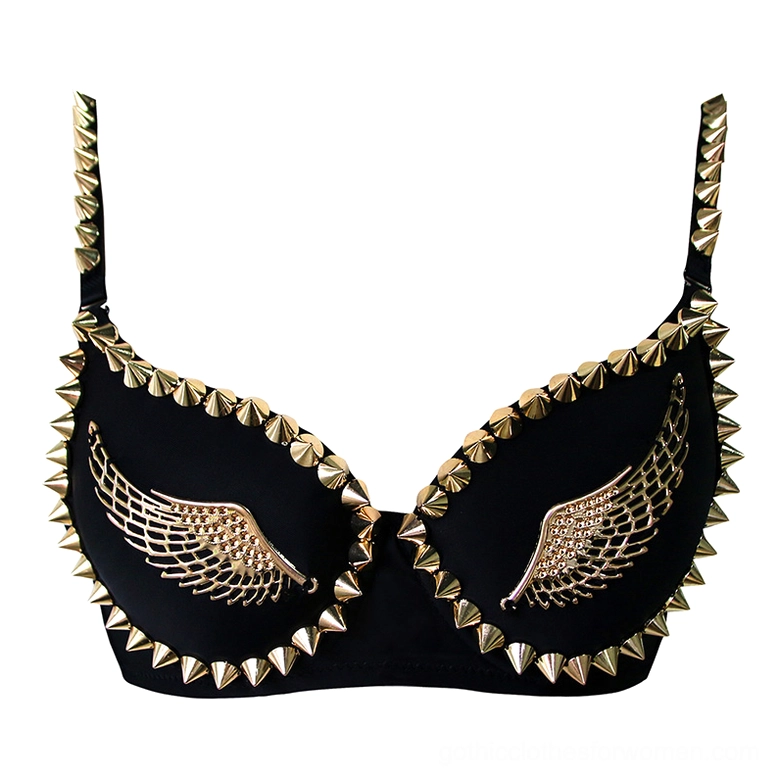 Flat lay of black spiked angel wings bustier bra showing detailed gold wing appliqués and cone rivet borders