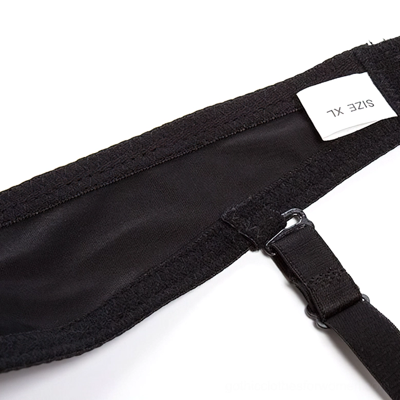 Size tag and adjustable strap detail of black gothic angel wings bustier with metal clasp
