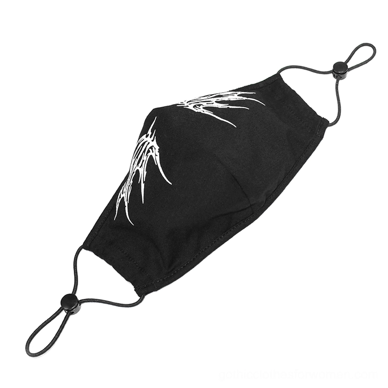 Flat lay overhead view of black gothic butterfly face mask with adjustable elastic ear straps and tension buckles