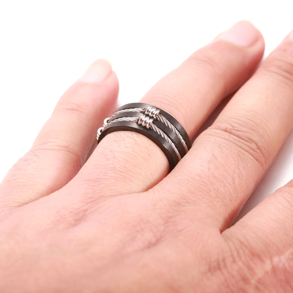 Alternative gothic cable ring worn on male finger, front close-up showing bold presence and comfortable fit on wider masculine hand