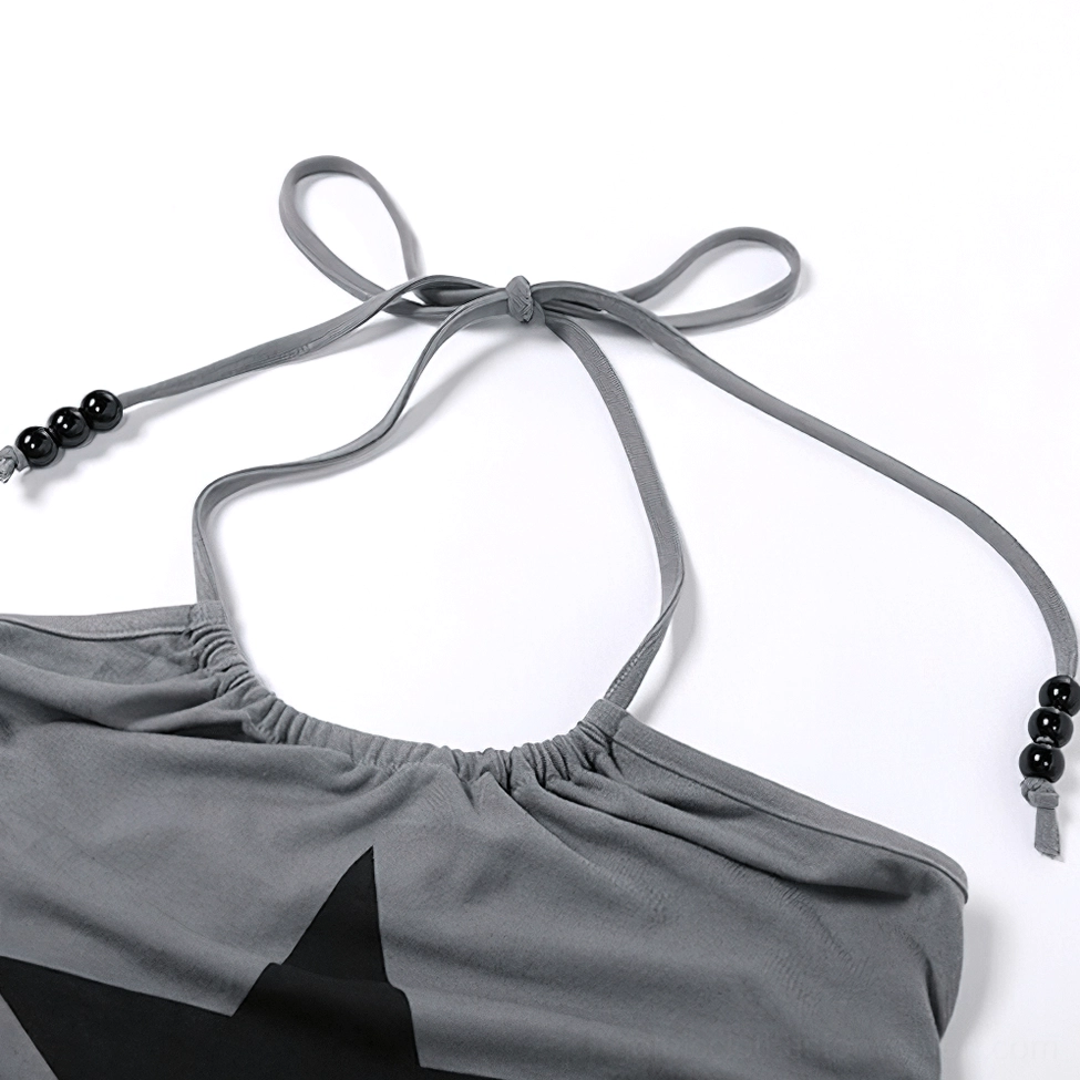 Close-up detail of ruched neckline and beaded tie straps on gothic star print cami, showing intricate craftsmanship