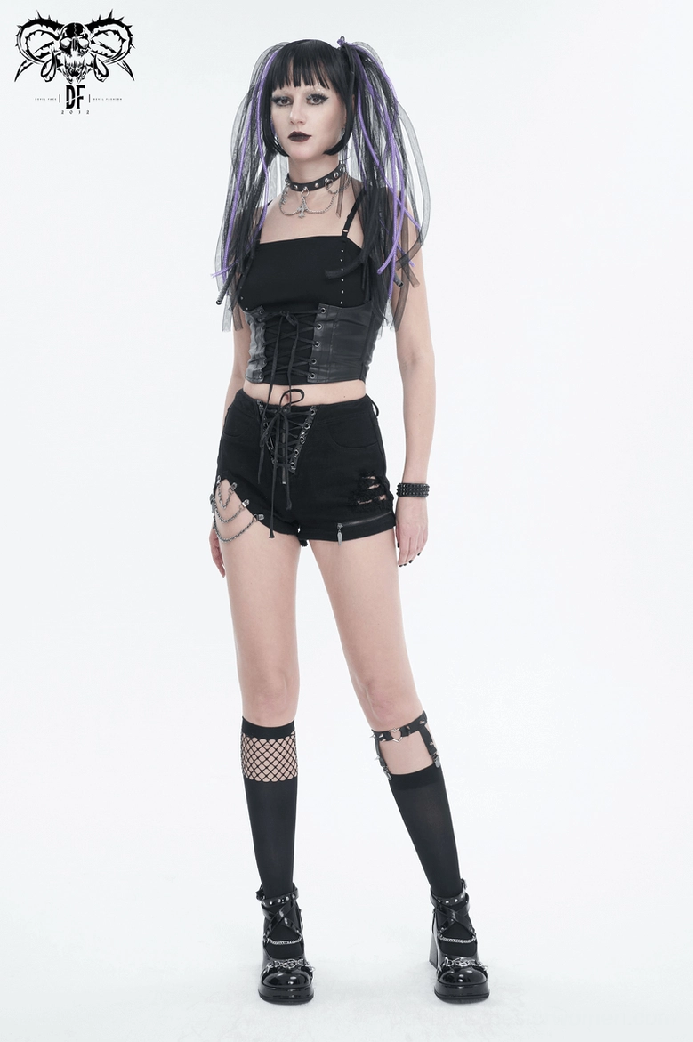 Black gothic lace-up cami top showing structured splice construction and studded design elements