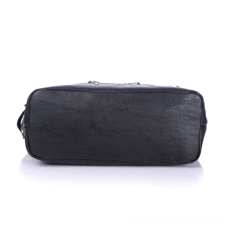 Bottom view of black gothic canvas tote bag showing smooth leather-like base panel and structural support