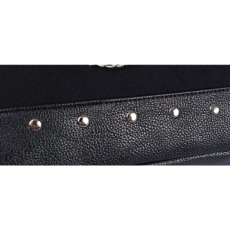 Black gothic canvas tote bag full product shot from front angle, featuring handcuff chains, rivets, and professional studio lighting