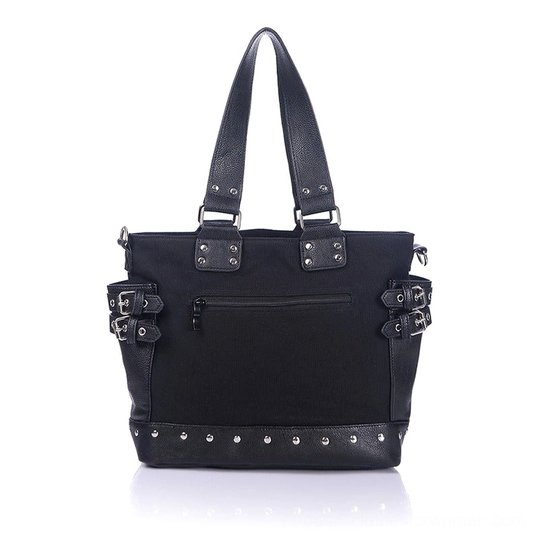 Rear view of black gothic canvas tote bag with back zipper pocket and side rivet buckle hardware