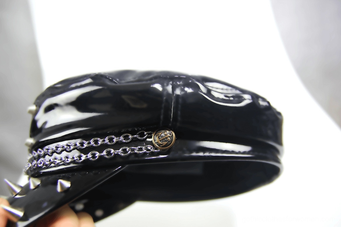 Chain trim and branded snap fastener detail on gothic military cap - rear bottom view