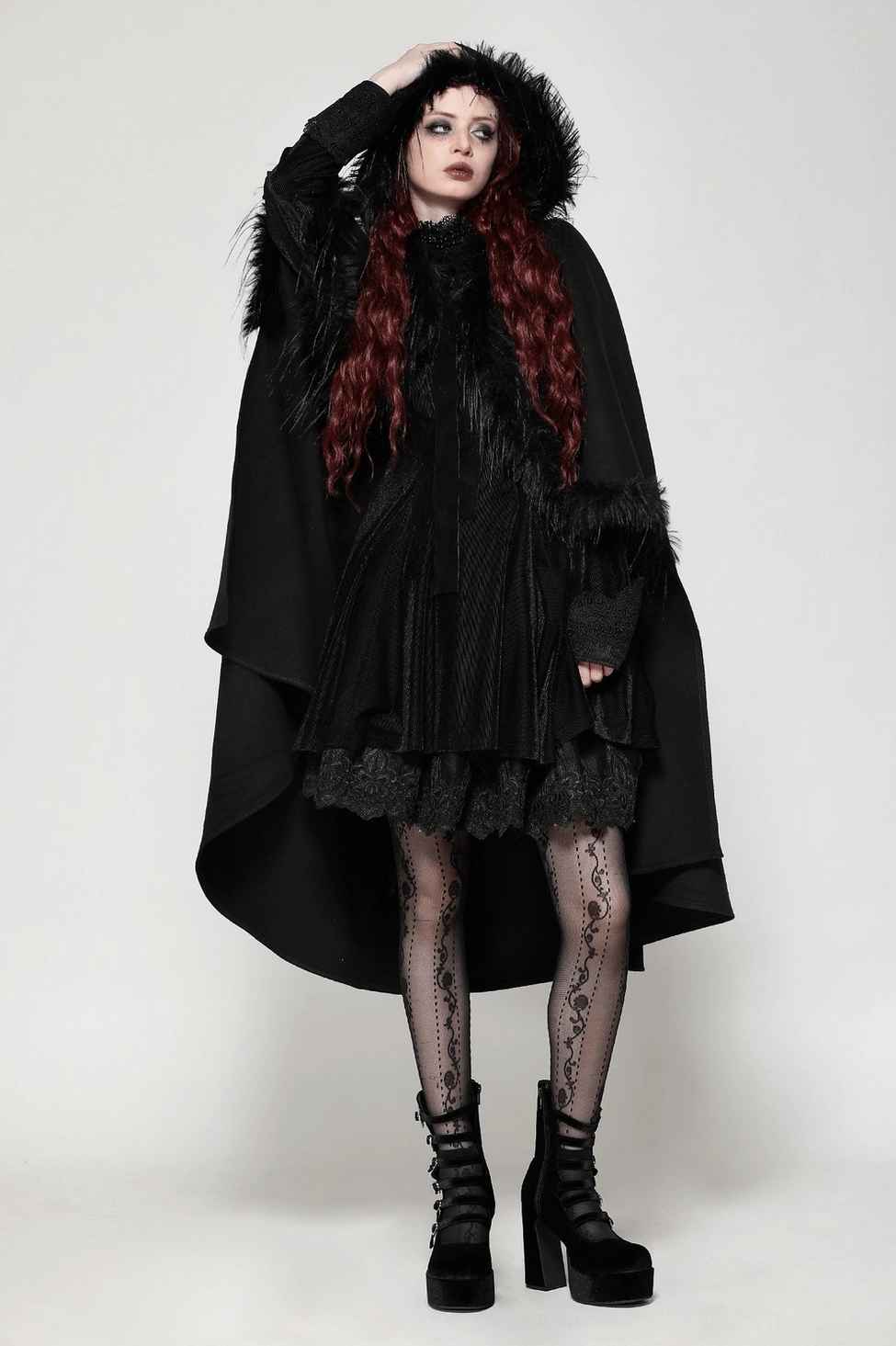 Black gothic hooded cape fashion styling with alternative aesthetic and dark clothing